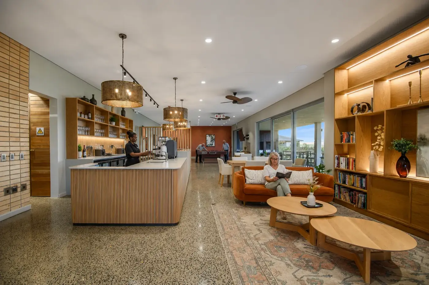 Reading in the library at the Capri Village clubhouse